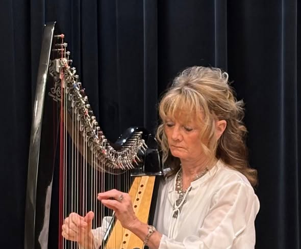 Celtic harpist performing at Durward's Glen